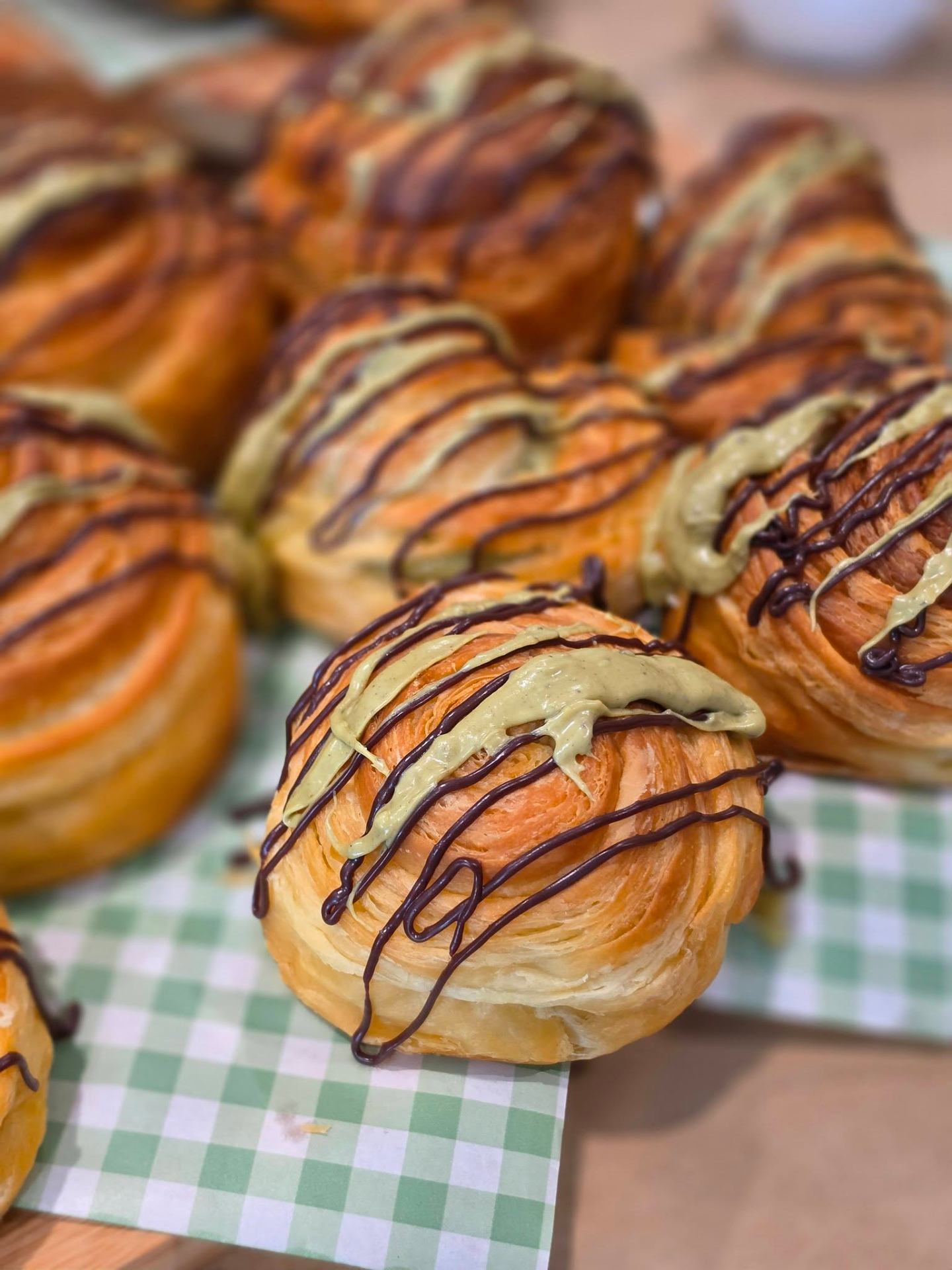 Freshly baked pistachio chocolate croissants at Hillside Bakery
