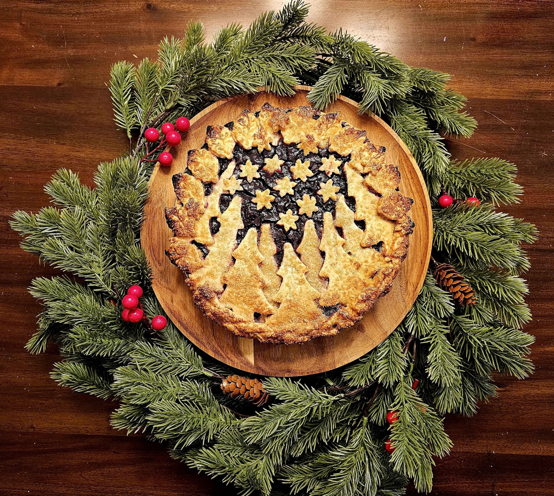 Berry pie with decorative pastry cutouts